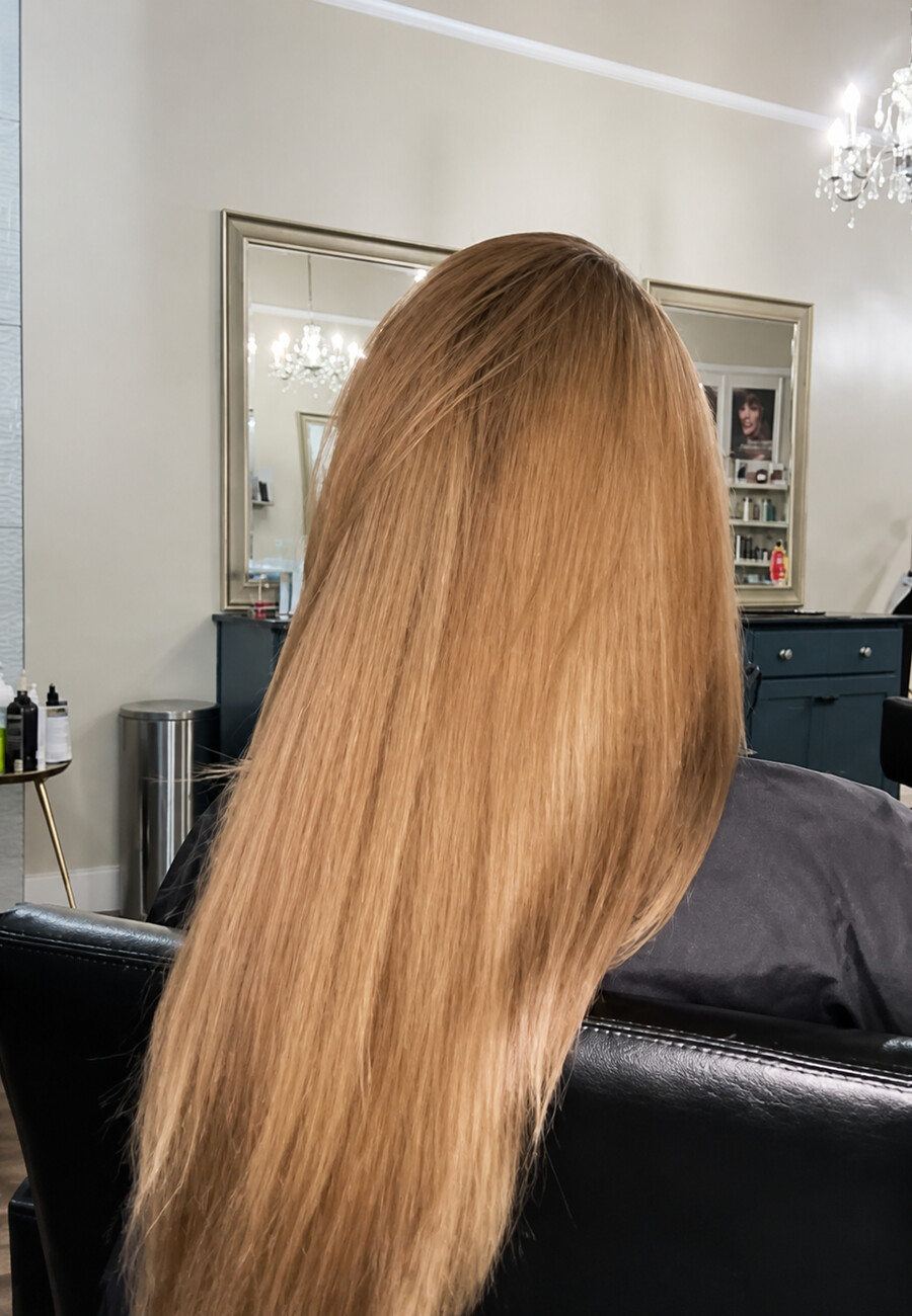 Long caramel hair falling past the shoulders