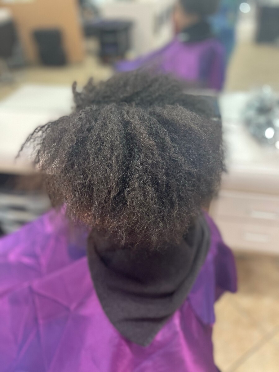 Short natural coils transformed with smooth chest-length extensions, before