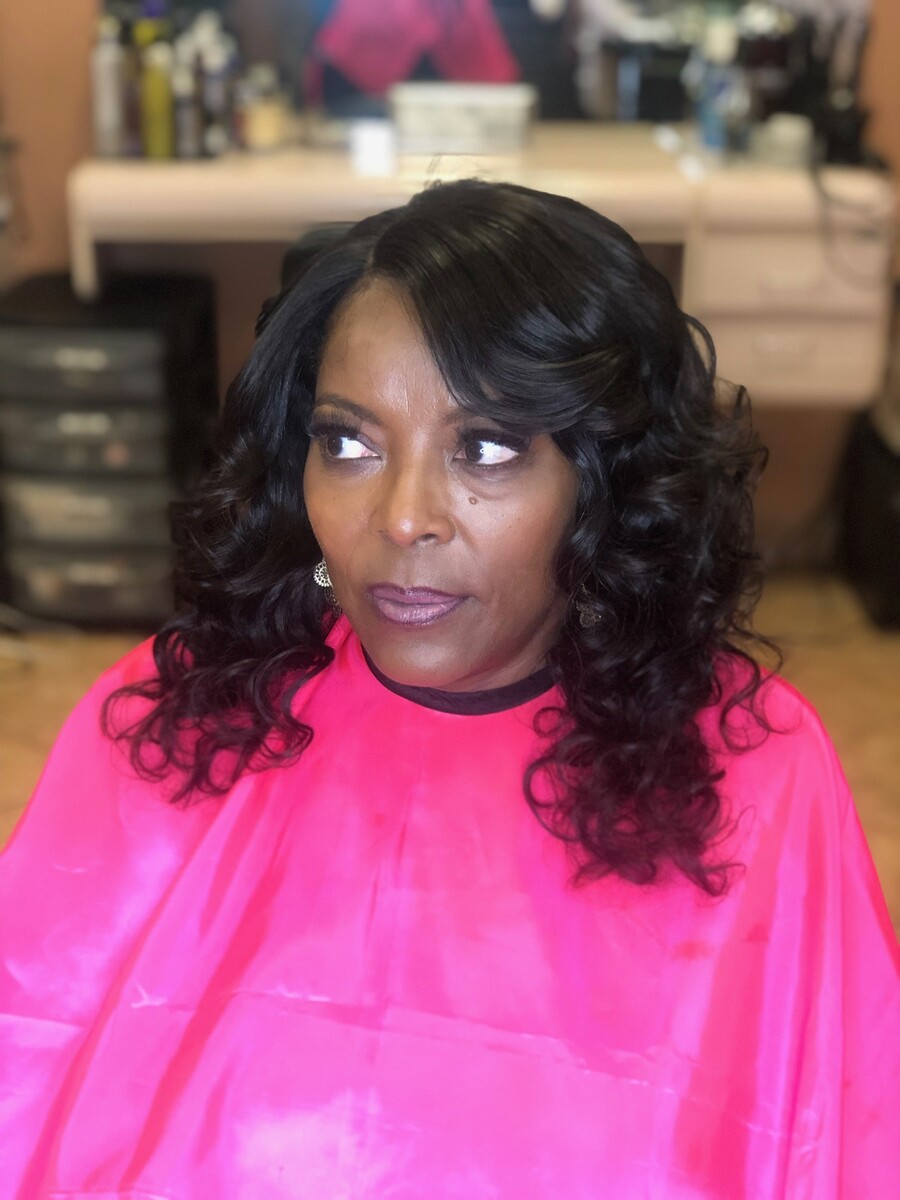 A close crop turned into soft chest-length waves, after