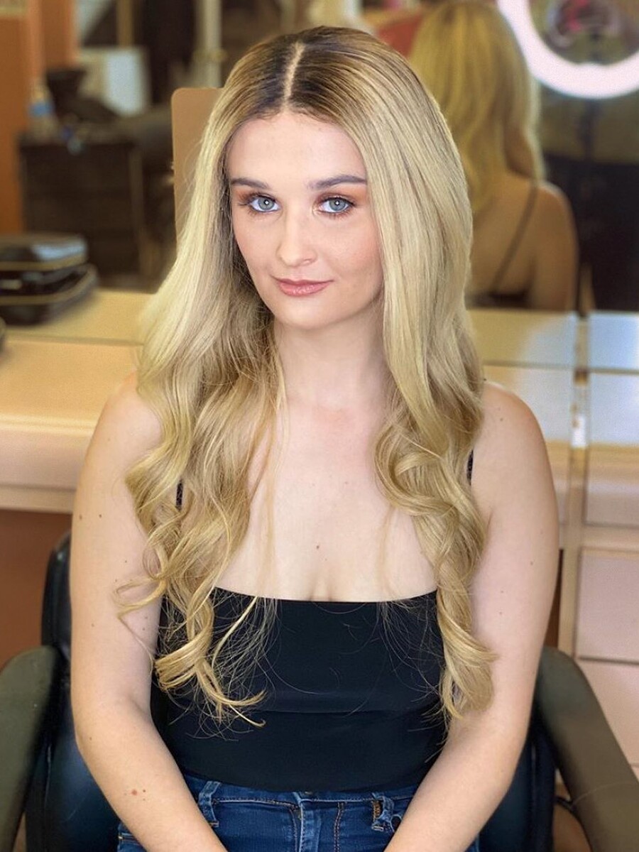 Shoulder-length light brown taken to waist-length blonde, after