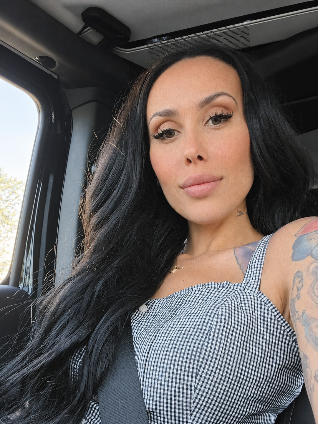 Straight dark hair past the shoulders with soft face-framing layers