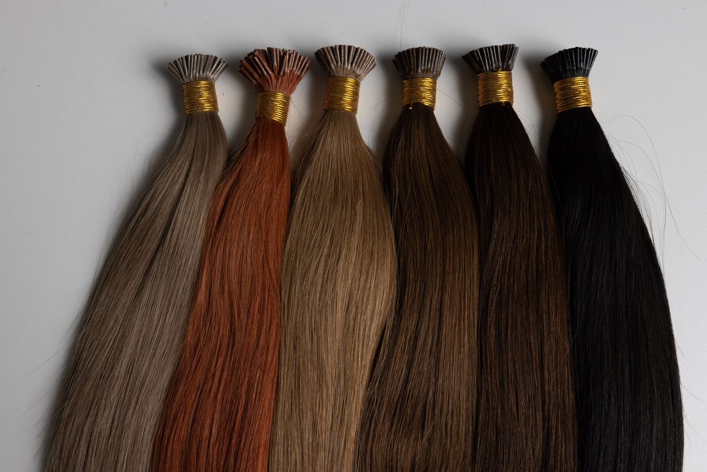 I-tip extension strands with copper beads at the tips