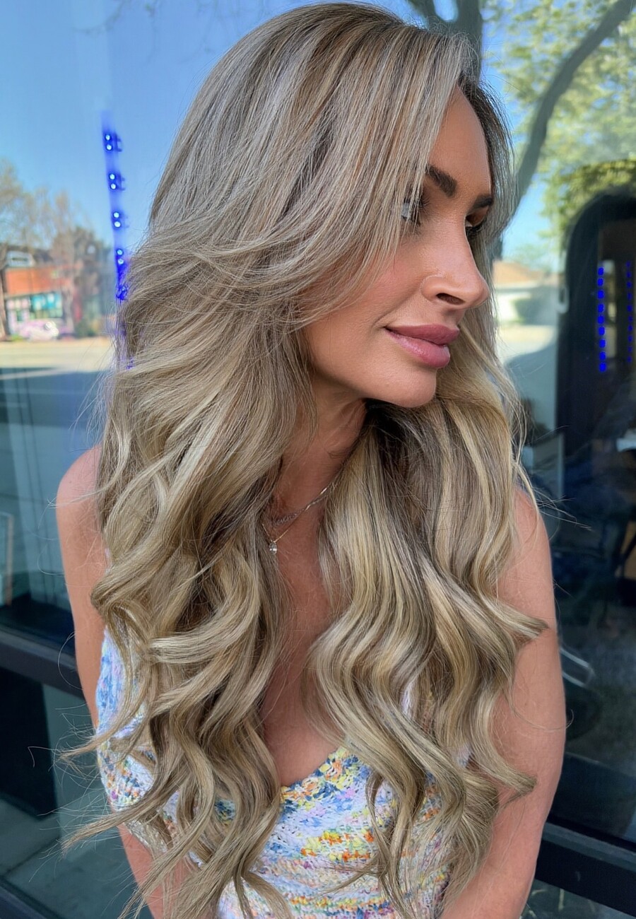 Cool ash blonde, waved and worn long