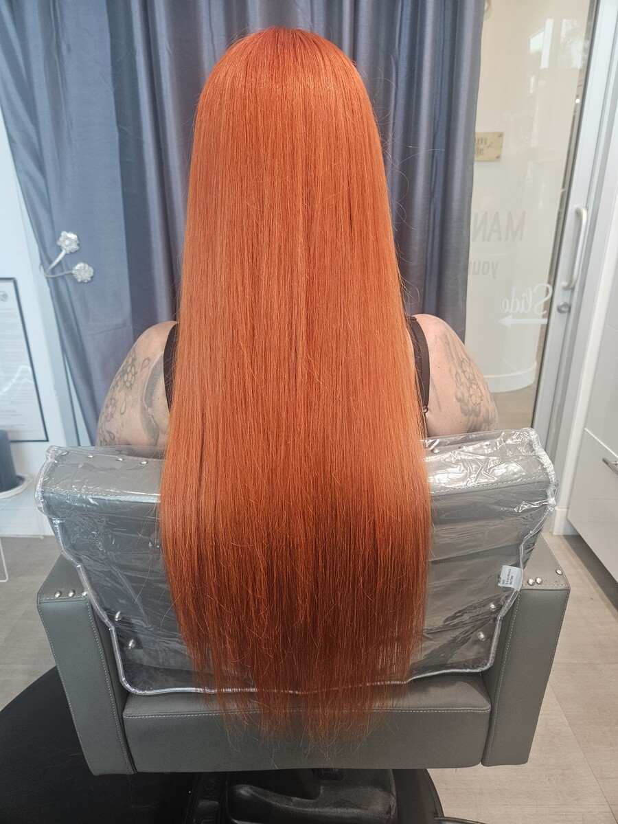 Long, straight copper hair, full from root to end, from behind, after