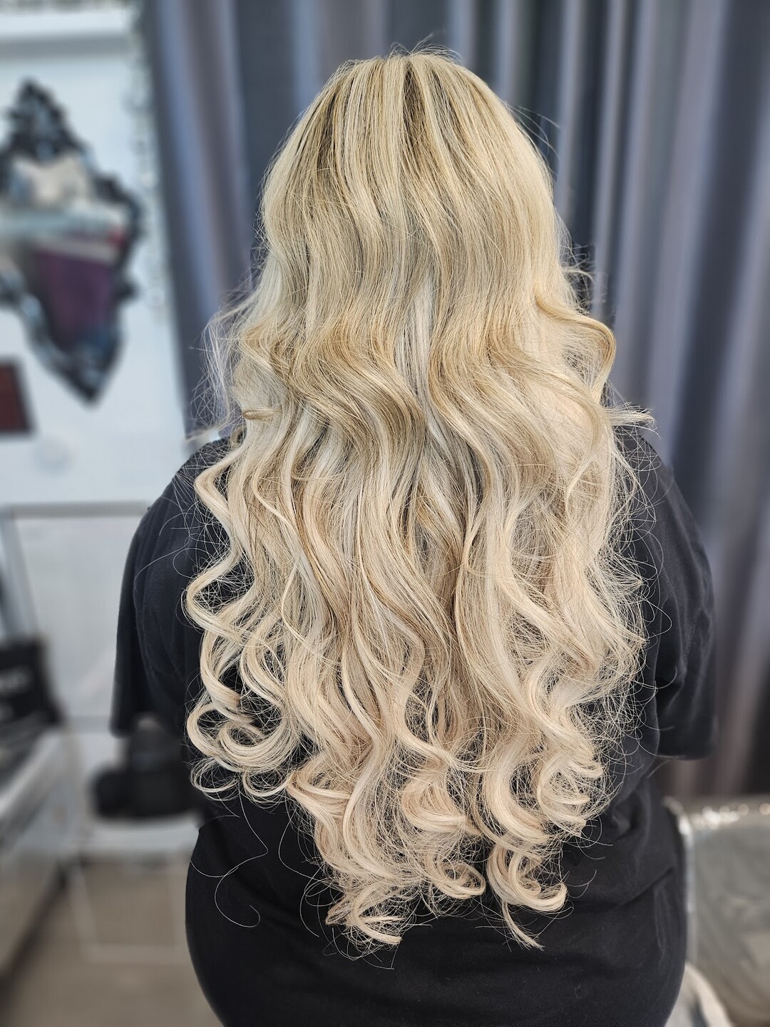 Long blonde waves past the waist