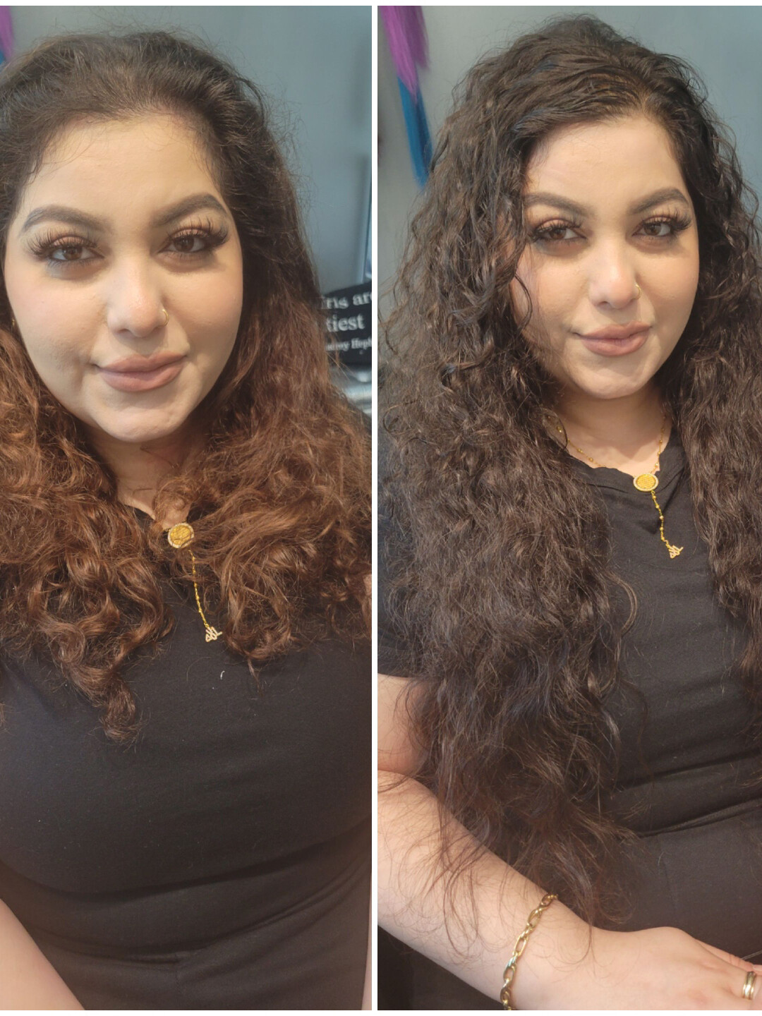 Two women with dark curls, smiling side by side