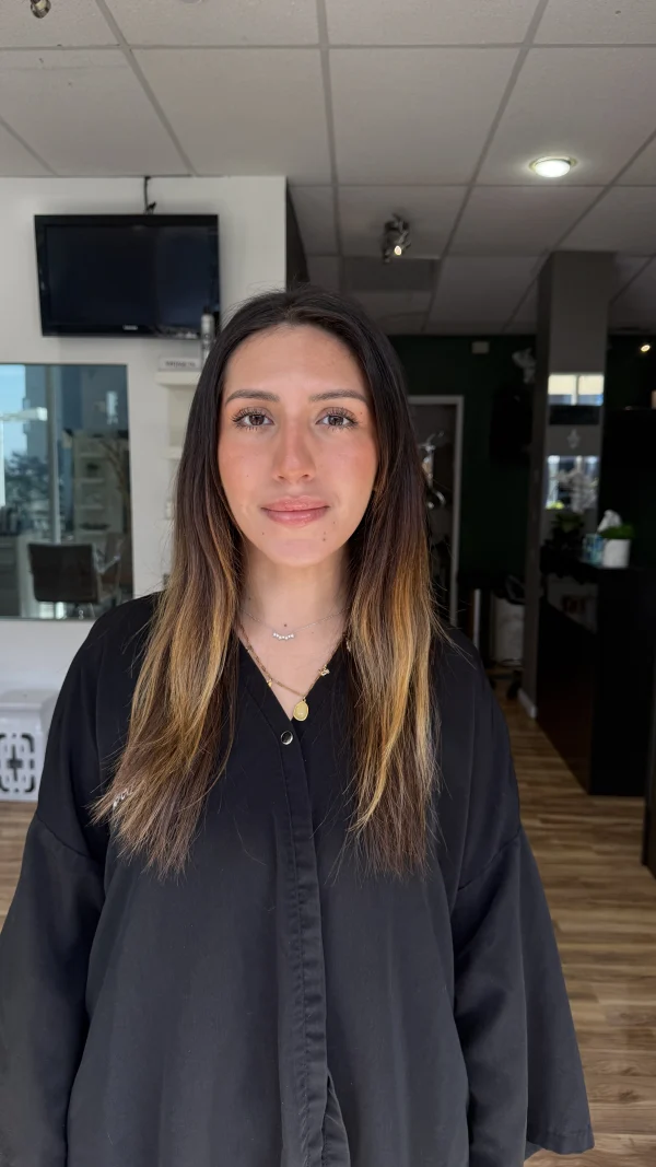 After: brunette hair with warm, lighter pieces around the face