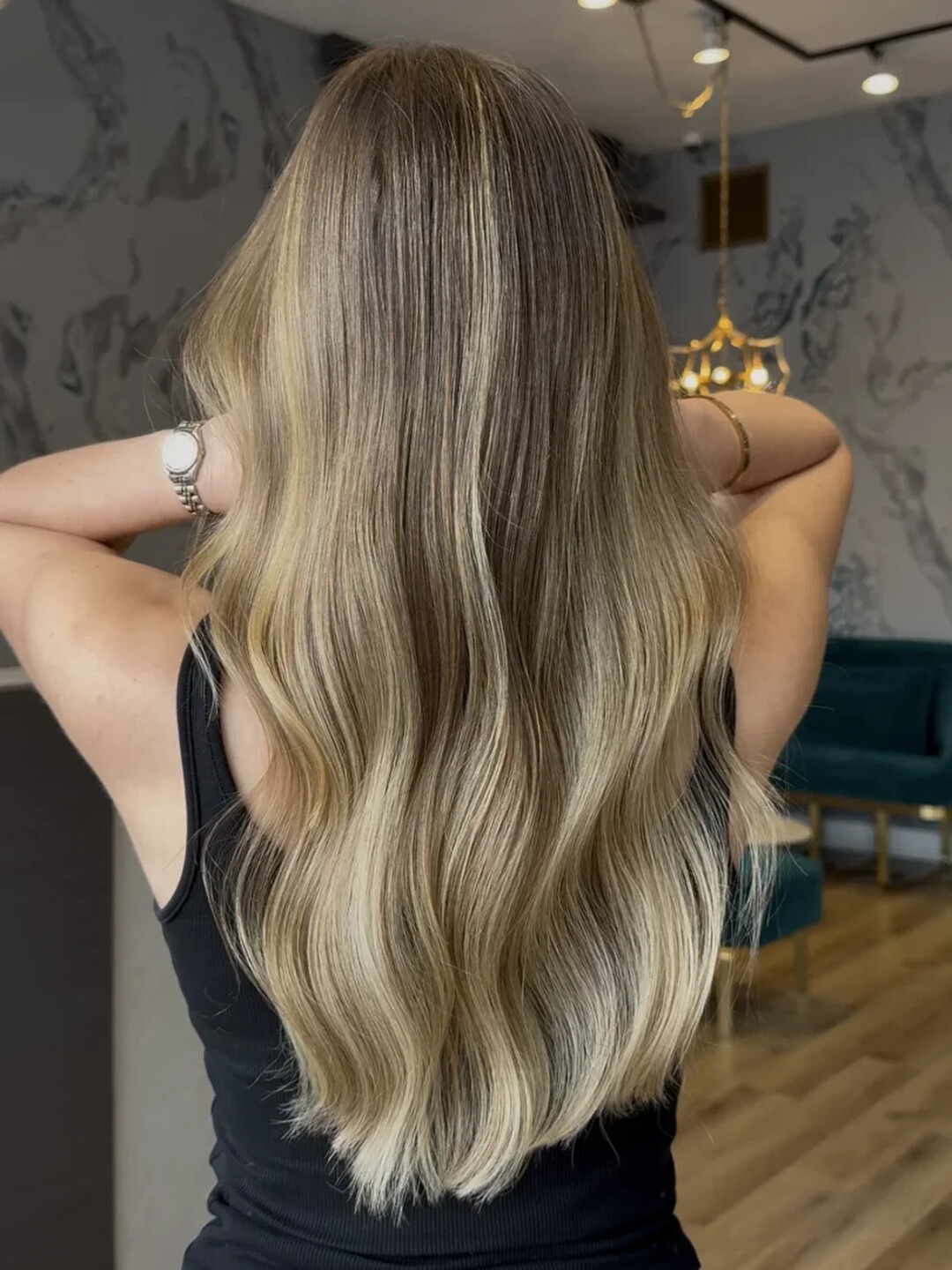 Ash-blonde balayage, long and softly waved